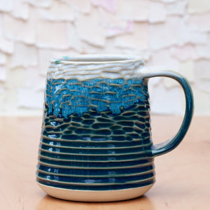 Saturn Carved Stein in Pacific