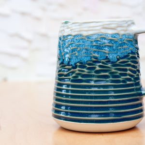 Saturn Carved Stein in Pacific